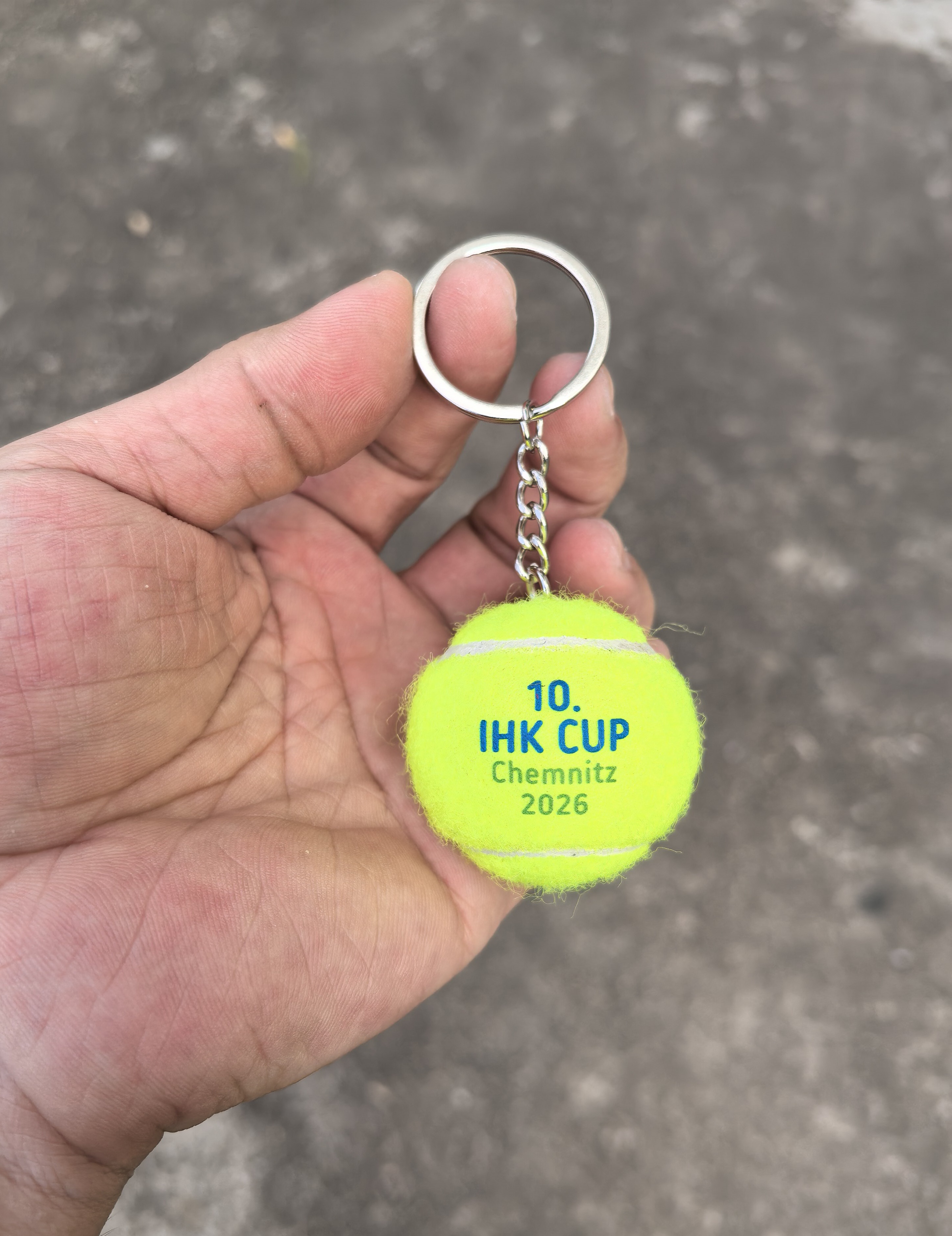 Tennisball-Schlüsselanhänger gelb mit Logo bedrucken lassen